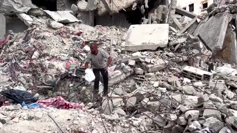 Desperate for cash, Gazans sell clothes plucked from rubble