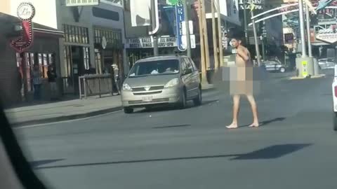 Man Strolls Down Las Vegas Street in Birthday Suit