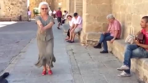 Mind blowing street singer and the old lady dance