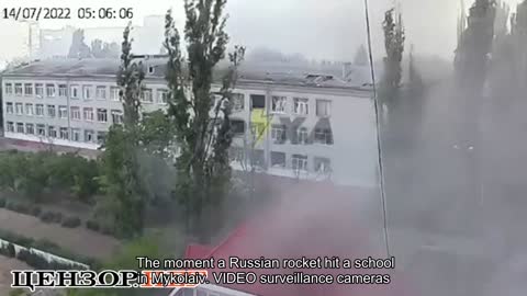 ️ The moment a Russian rocket hit a school in Mykolaiv. VIDEO surveillance cameras
