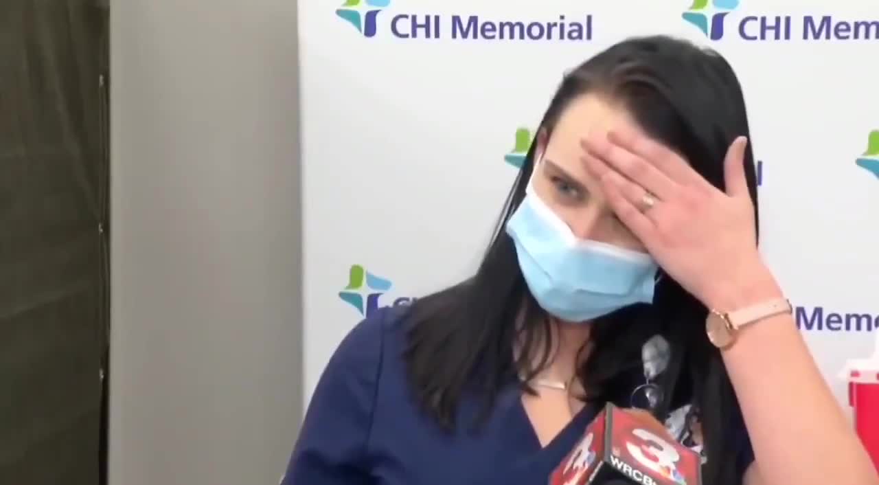 Nurse passes out on live tv after taking the Covid vaccine. Time stamp 00:33