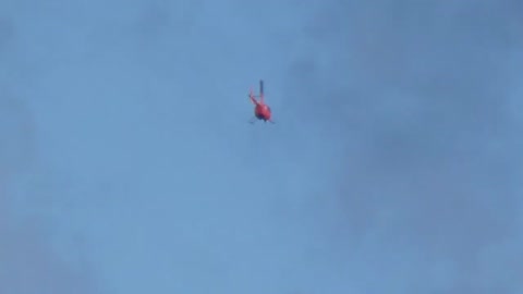 Police chopper with nose Dome camera during protest in Preston