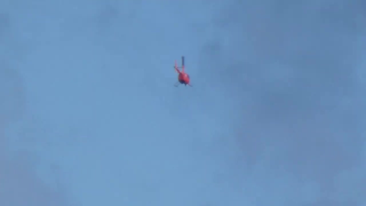 Police chopper with nose Dome camera during protest in Preston