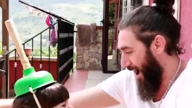 Prank his daughter with a magician's hat