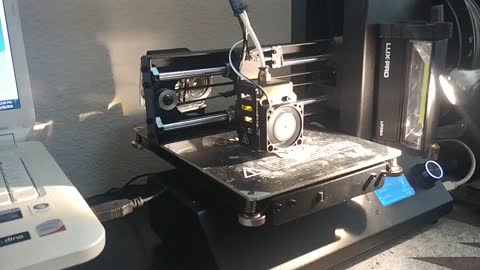 3D printing a fan guard.