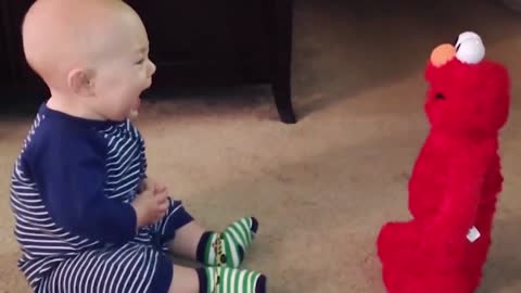 Adorable baby reactions to talking Elmo