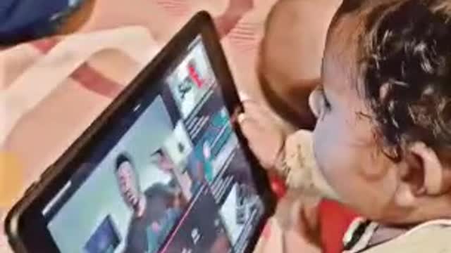Cute baby watching iPad