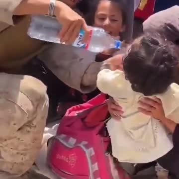 Touching Video Shows U.S. Soldier Give Water to Afghan Children