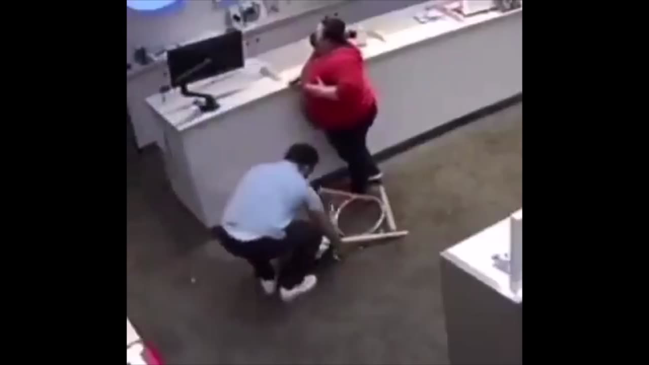 obese chick breaks chair apart in a store when she sits on it.