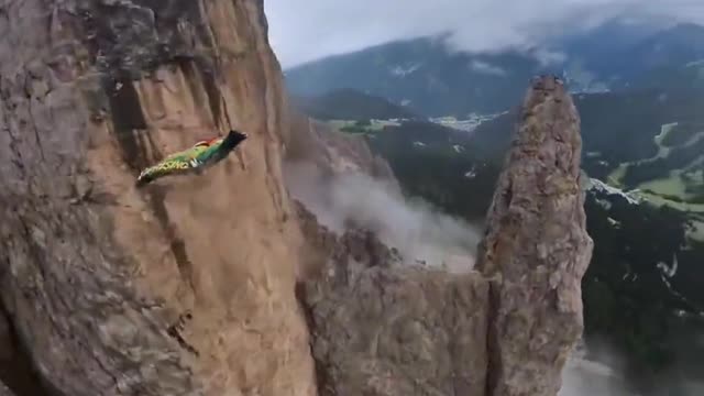 he loveless are always free! Extreme sport wingsuit flying