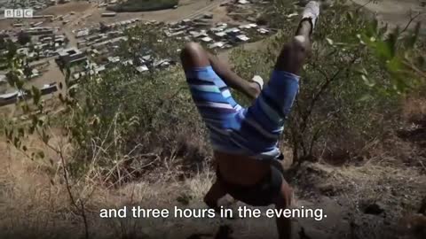 Meet the Ethiopian man who walks on his hands - BBC News