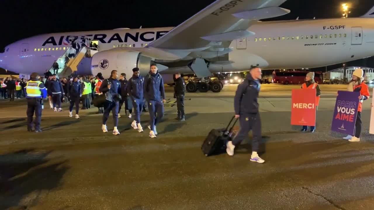 World Cup runners-up France land in Paris