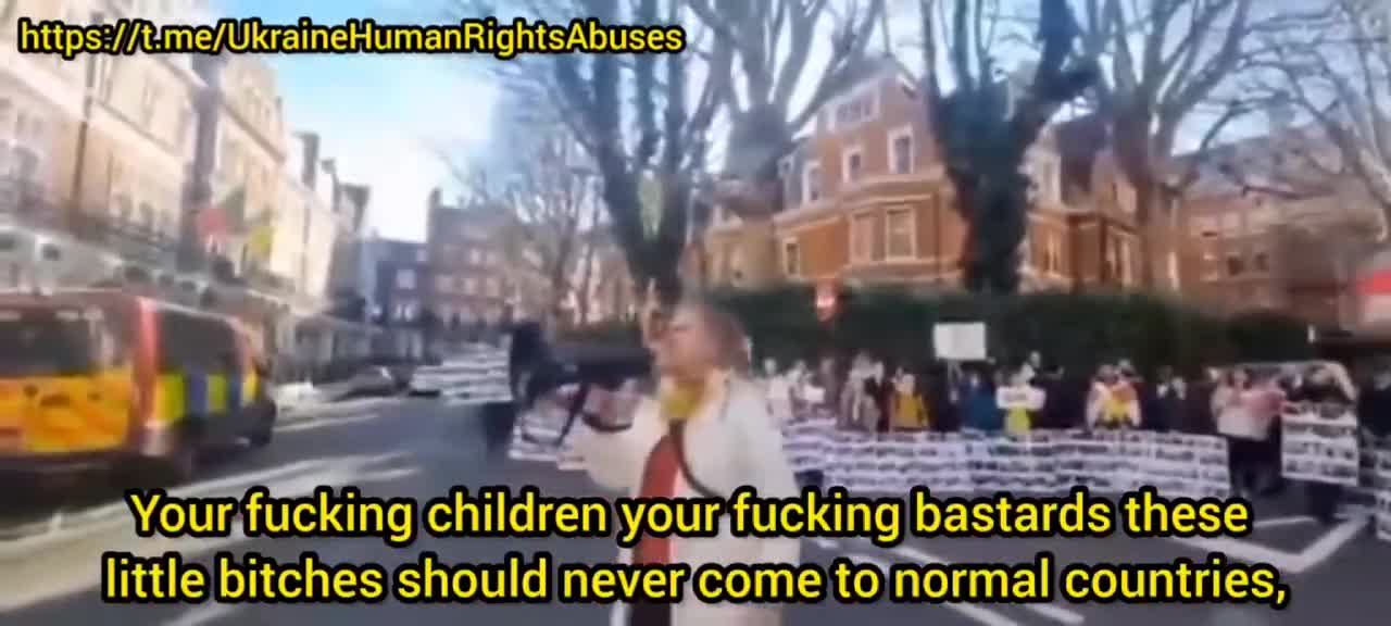 Ukrainian "refugees" gathered outside the Russian consulate in London