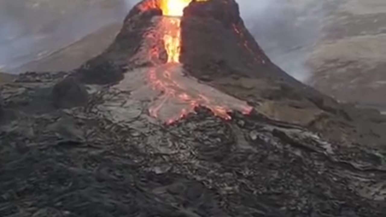 A volcano erupted in Iceland and residents gathered to watch it