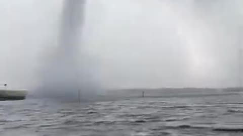 Florida Waterspout Comes On Shore As Tornado_ Lofts Debris Into Air
