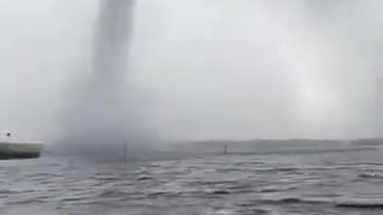 Florida Waterspout Comes On Shore As Tornado_ Lofts Debris Into Air