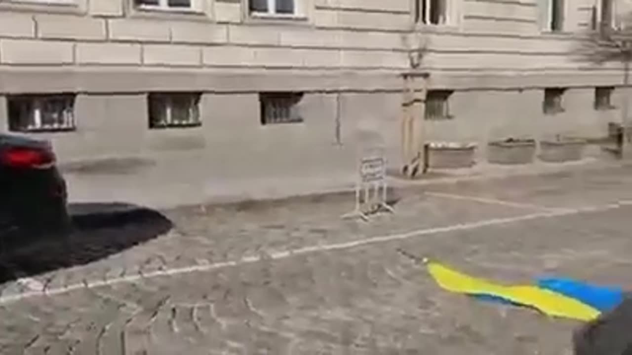 Bulgaria, the Ukrainian flag from the building of the local city hall and threw it on the street