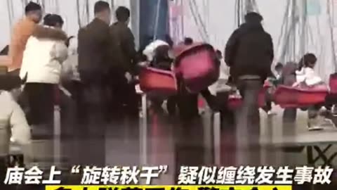 Some Unsuspecting People Having Fun On A Ride Are Suddenly Strewn About As The Machine Fails