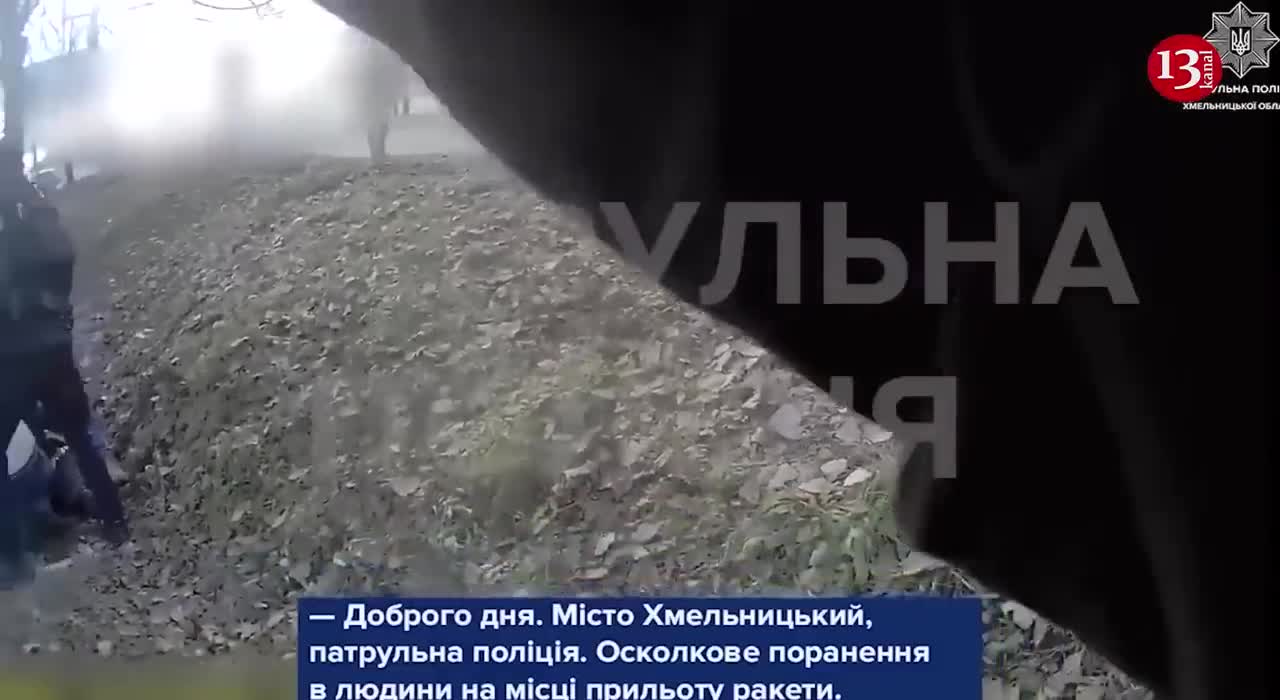 Ukrainian police rescue civilians who were fired upon by Russians in the street