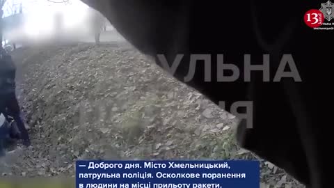 Ukrainian police rescue civilians who were fired upon by Russians in the street