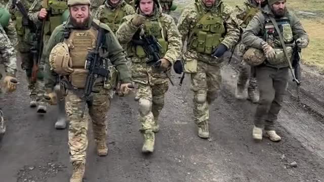Dozens of Ukrainians Walk Through Bakhmut