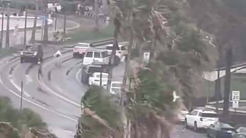Water spout ripping through crowed