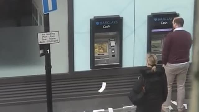 People confused as london ATM spits out paper for a really long time