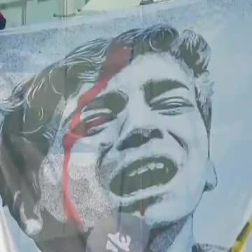 #Greenpeace and #UnmuteGaza hung an #artwork by the #American #artist Shephard Fairey