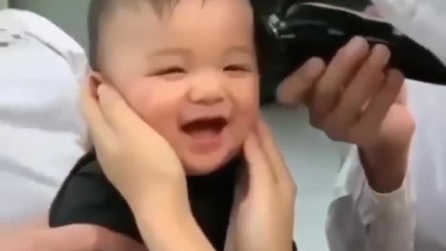 cutest baby in the world cutting hair