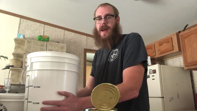 Home Brewing Beer Dancing With a bucket of beer