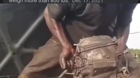 Man lifting 400lbs engine