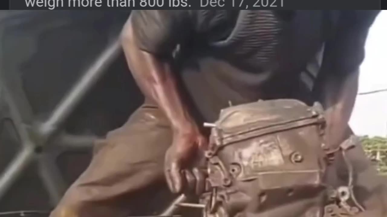 Man lifting 400lbs engine