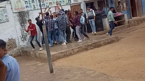 boys dance on first rank on school