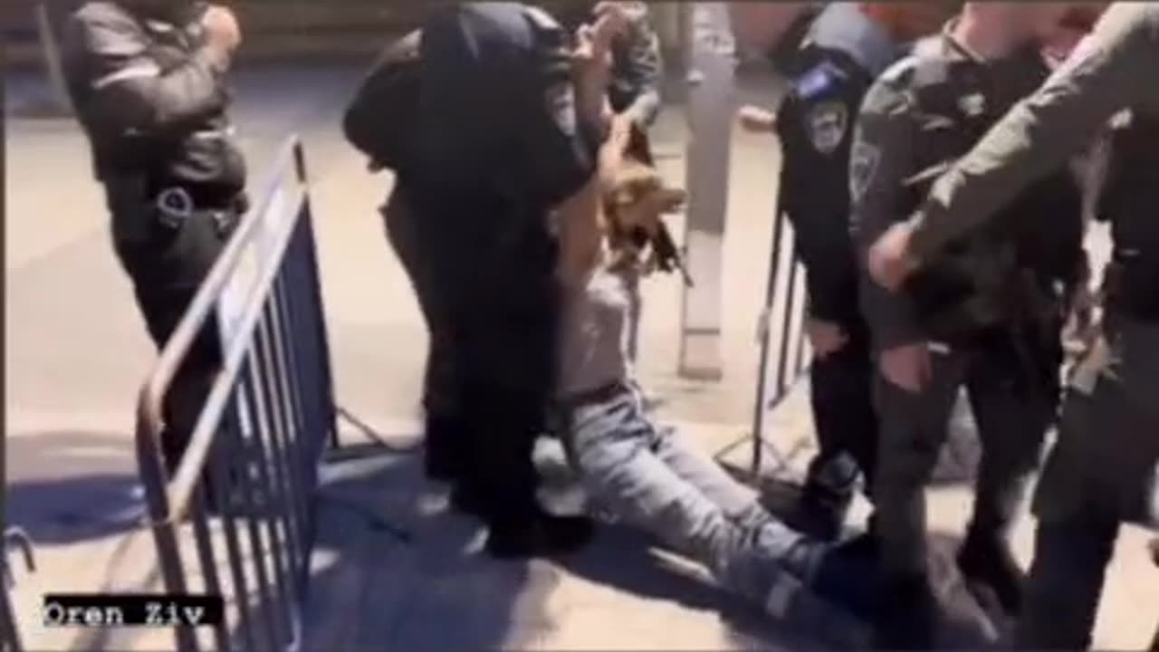 Isreali police forcibly remove protester