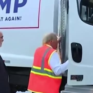 Video of Trump grabbing truck door sparks wild conspiracy theories