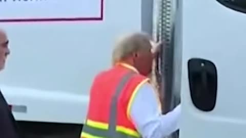 Video of Trump grabbing truck door sparks wild conspiracy theories