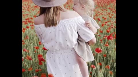 CUTE BABY WALKING IN A FLOWER GARDEN