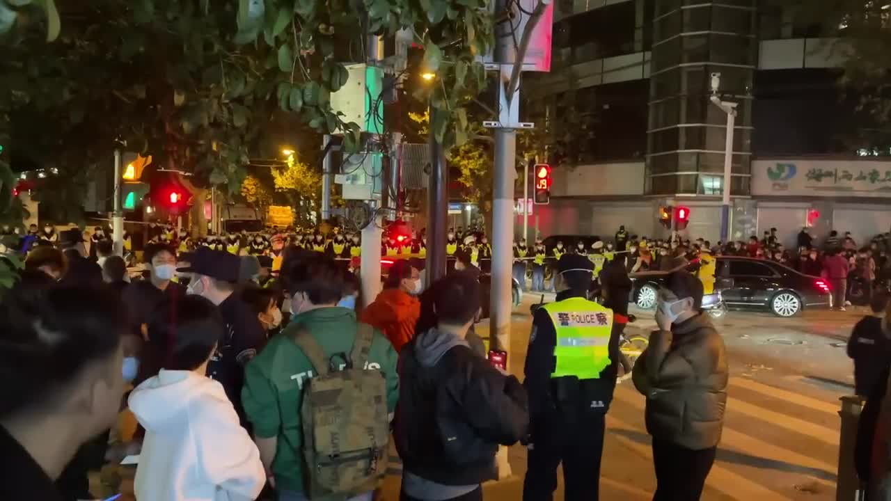 China_ Police stand guard at site of Shanghai protest _ AFP