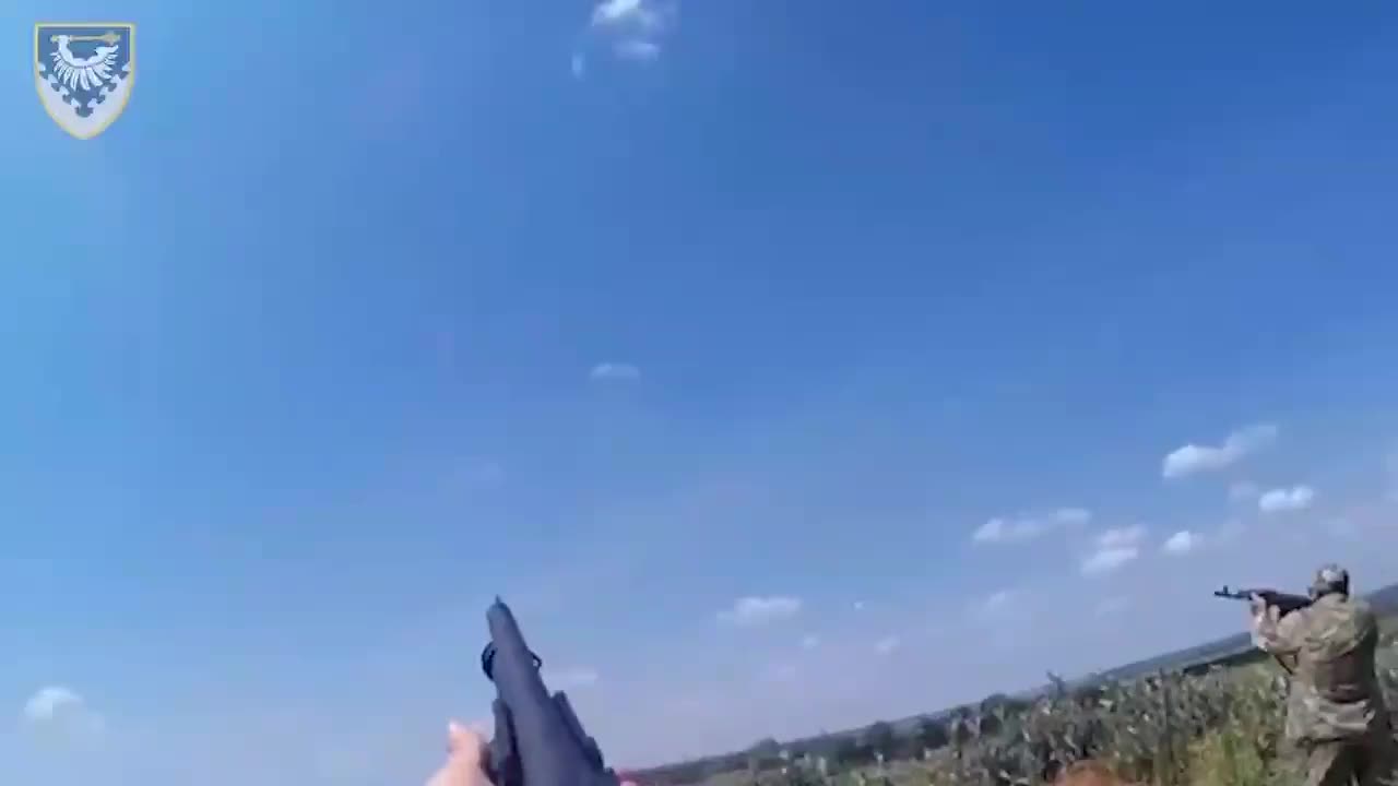 Ukranian soldiers shooting down Russian Kamikaze drone with small arms