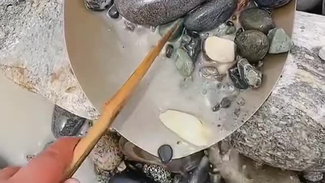 Scoop up rocks