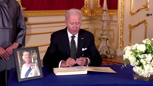 Biden signs condolence book for 'honorable' Queen