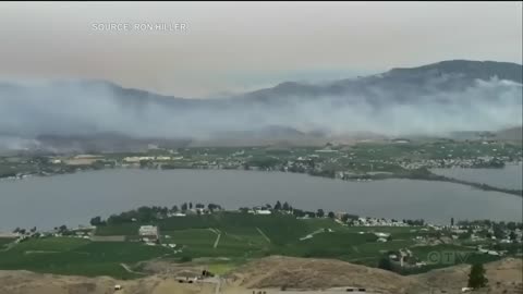 Residents in Osoyoos, British Columbia flee as U.S. wildfire crosses border