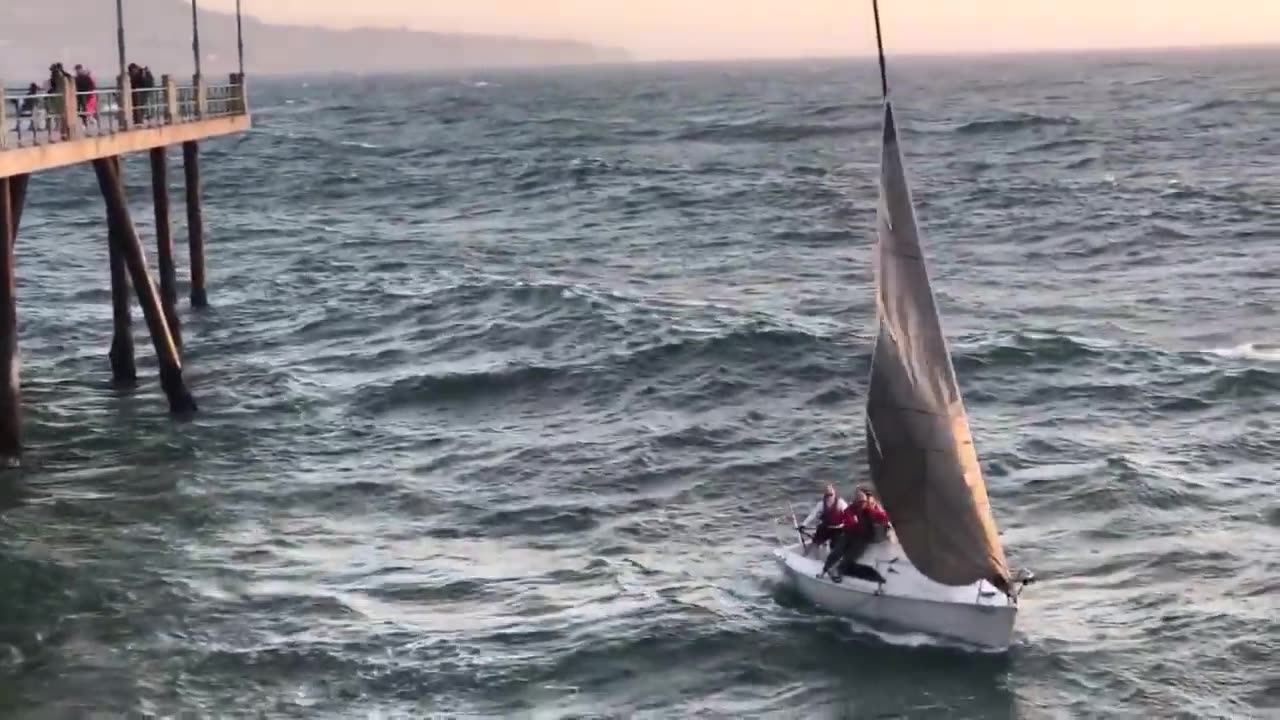 Sailboat Capsized into Redondo Beach Pier in California!!