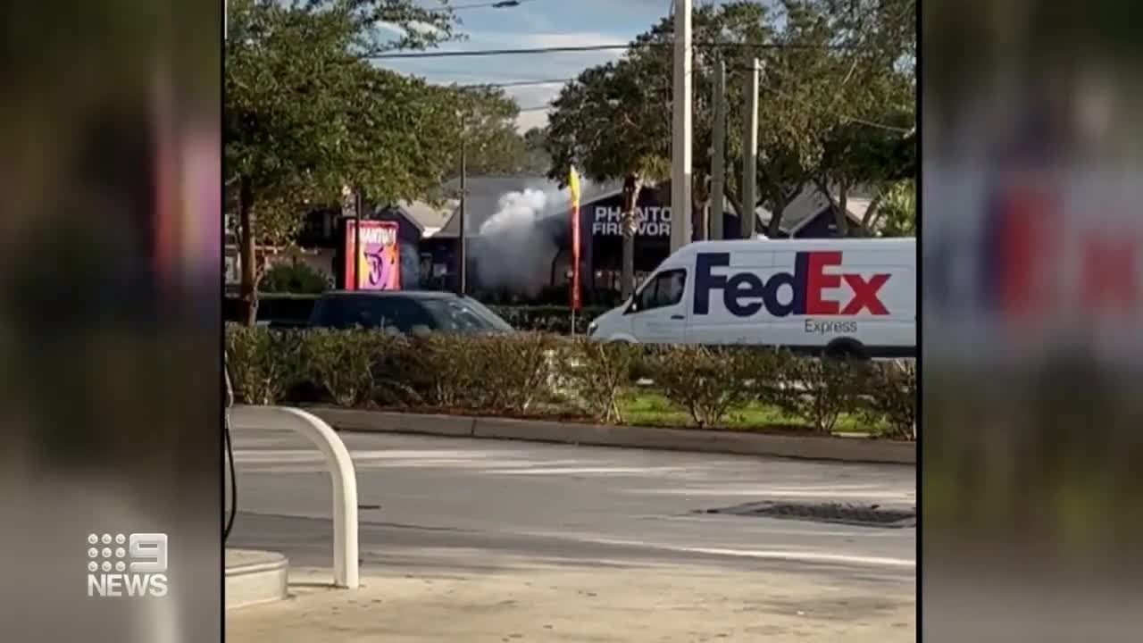 Flames engulf Florida fireworks store after car crashes into building _ 9 News Australia