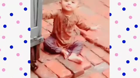 Baby enjoy rain in Pakistan amazing