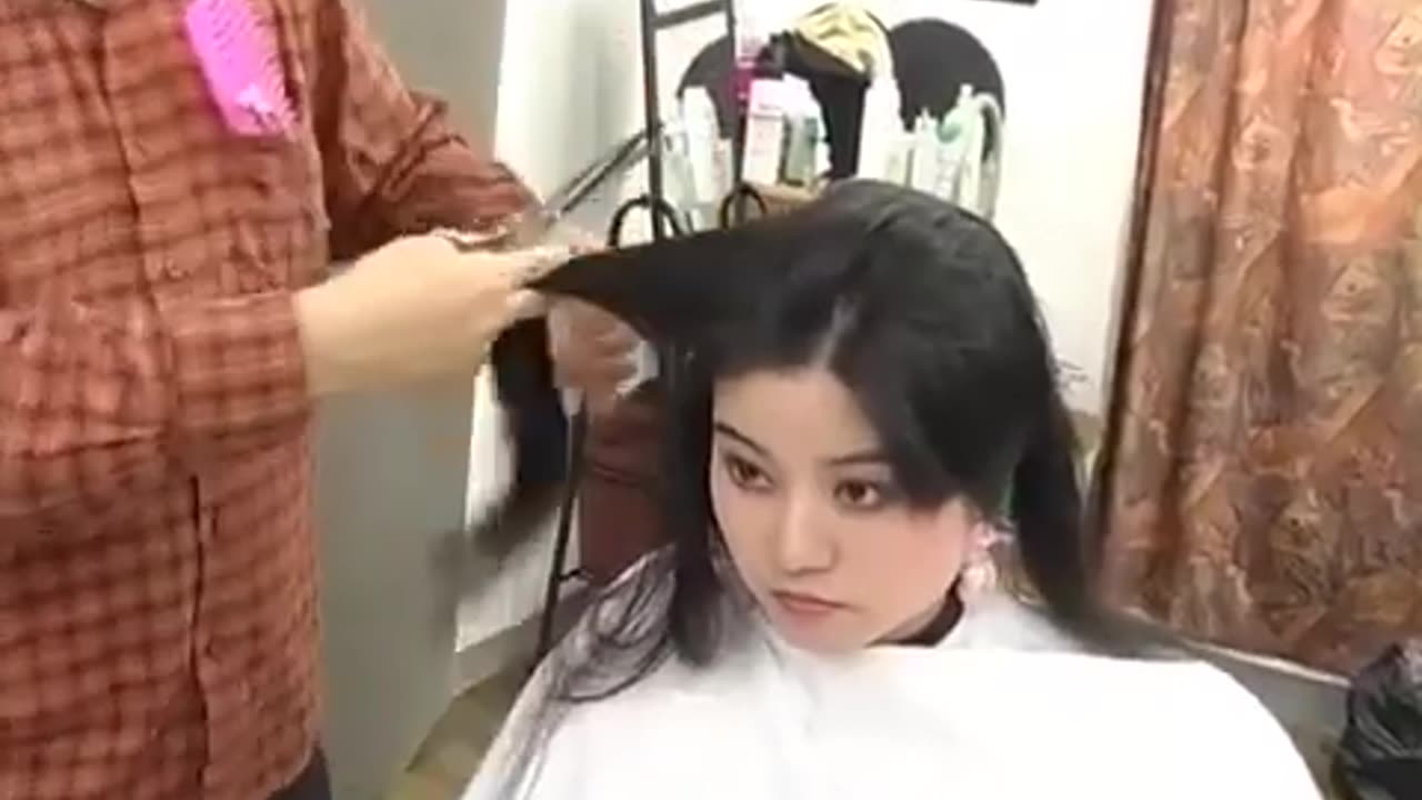 Beautiful woman haircut and headshaved