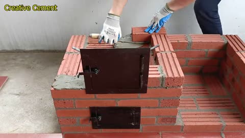 Outdoor wood stove from red brick and cement