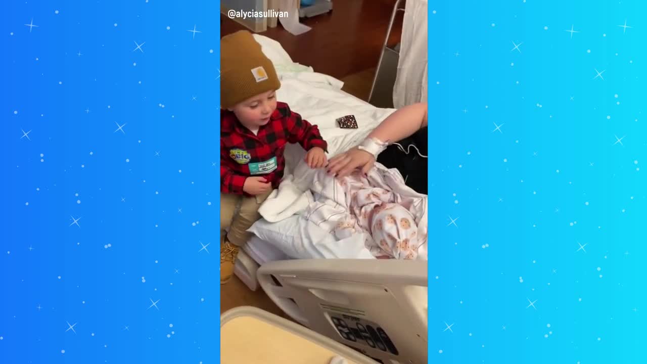 Toddler meets newborn little brother in adorable moment