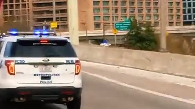 Truckers being escorted out of DC by the police