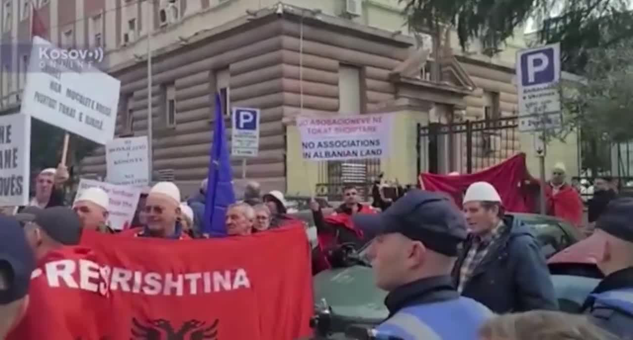 Albania: kosovo supporters wave US, EU flags outside Serbian embassy